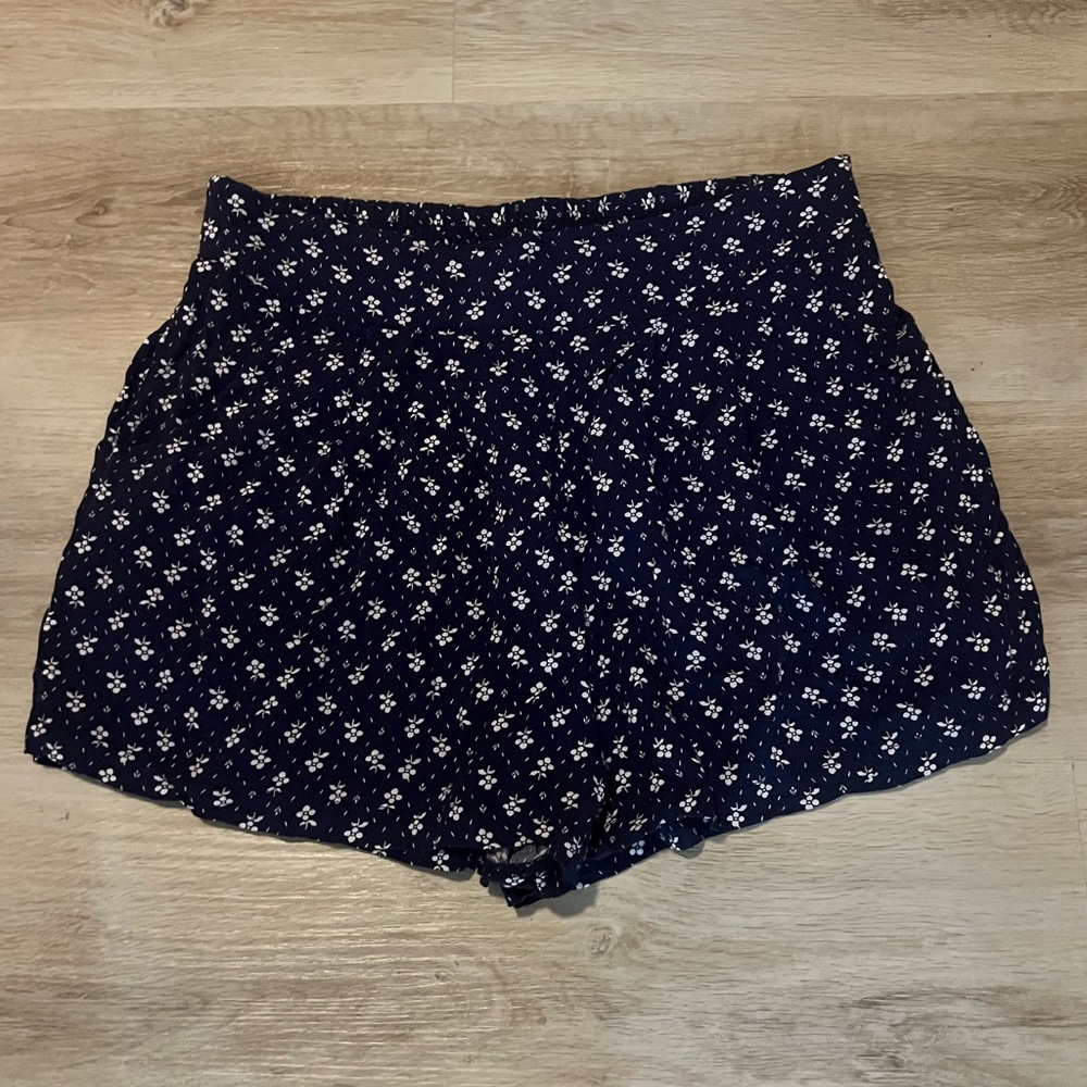 Blue floral shorts.